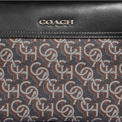 Túi Coach đen hoạ tiết chữ
