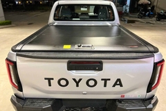 Nắp thùng cuộn cơ Hilux hiệu Overland