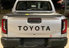 Nắp thùng cuộn cơ Hilux hiệu Overland