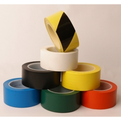 Băng keo dán nền vàng đen 50mm*33m