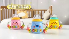 ĐỒ CHƠI - Lục lạc, gặm nướu hình bình sữa có nhạc vui nhộn cho bé