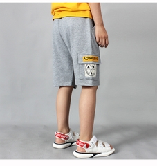 Quần short bé trai cotton thoáng khí phối túi hộp kiểu dáng thể thao
