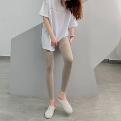 Quần legging nữ dài chín tấc ôm dáng co giãn, in chữ trên đùi thời trang