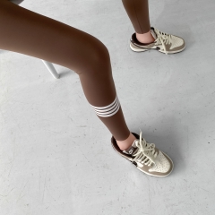 Quần legging nữ co giãn dài chín tấc, thiết kế kẻ sọc ống quần thời trang