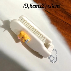T12. Lược gấp gắn charm