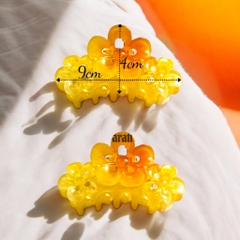 T5.Kẹp tóc hoa mai