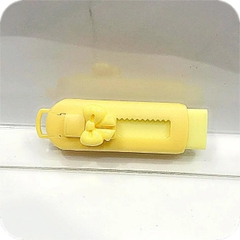 Bút tẩy có thể kéo đẩy gắn charm nơ