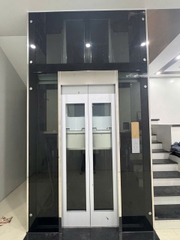 Thang Máy Tiêu Chuẩn Khung Thép Vách Kính