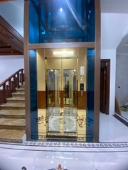 Thang Máy Tiêu Chuẩn Khung Thép Vách Kính
