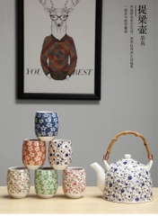 Sét ấm pha trà kèm khay trúc hoạ tiết hoa nhí