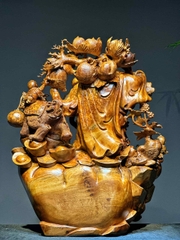 Tượng di lạc đứng bao tiền vàng gỗ nu ngọc am đẹp