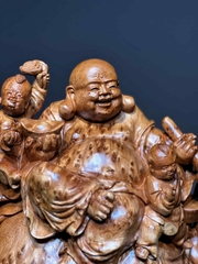 Tượng di lạc ngồi bao tiền vàng Gỗ Nu Ngọc Am thơm