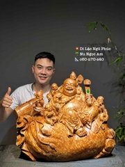 Tượng di lạc ngồi bao tiền vàng gỗ nu ngọc am đẹp