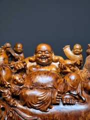 Tượng Di lạc  ngồi bao tiền vàng gỗ nu ngọc am đẹp