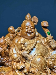 Tượng di lạc ngồi bao tiền vàng gỗ nu ngọc am đẹp