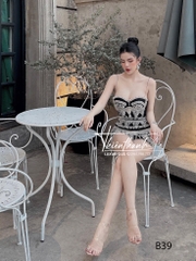 Đầm TK Ngắn Cúp Ngực Đính Đá Tua Rua Mũi Nhọn