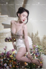Đầm TK Ngắn Khoét Ngực Kết Tua Rua