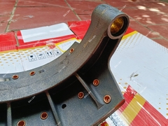 Má phanh liền xương Howo sau cầu Man (12 lỗ)