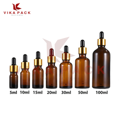 CHAI THỦY TINH ĐỰNG TINH DẦU MÀU NÂU NẮP BÓP VÀNG CAO SU ĐEN