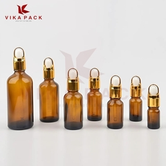 CHAI THỦY TINH ĐỰNG TINH DẦU MÀU NÂU NẮP VÀNH VÀNG