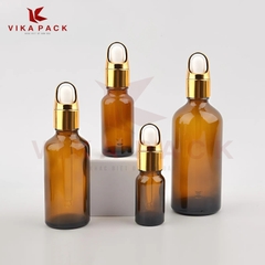 CHAI THỦY TINH ĐỰNG TINH DẦU MÀU NÂU NẮP VÀNH VÀNG
