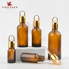 CHAI THỦY TINH ĐỰNG TINH DẦU MÀU NÂU NẮP VÀNH VÀNG