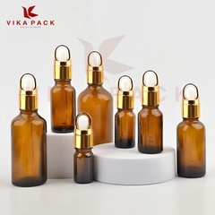CHAI THỦY TINH ĐỰNG TINH DẦU MÀU NÂU NẮP VÀNH VÀNG