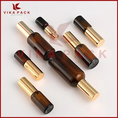 CHAI THỦY TINH ĐỰNG TINH DẦU MÀU NÂU NẮP XỊT XƯƠNG VÀNG