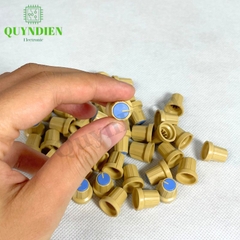 Núm Nhựa Volumn Màu Xanh Thân Vàng