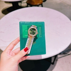 Rolex Mặt Số La Mã |Nữ Giới |Xanh Lá |Dây Kim Loại Demi Vàng Gold |Máy Pin (Máy Quartz) |Size 31mm