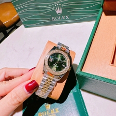 Rolex Mặt Số La Mã |Nữ Giới |Xanh Lá |Dây Kim Loại Demi Vàng Gold |Máy Pin (Máy Quartz) |Size 31mm