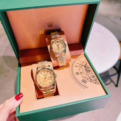 Rolex Mặt Niềng Khía |Cặp Đôi |Dây Kim Loại Vàng Gold |Máy Pin (Máy Quartz) |Size 41x31mm