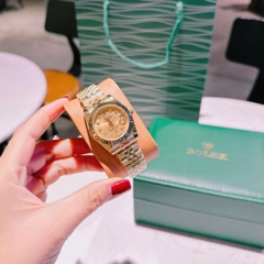 Rolex Mặt Niềng Khía |Cặp Đôi |Dây Kim Loại Vàng Gold |Máy Pin (Máy Quartz) |Size 41x31mm