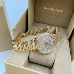 Burberry The Classic |Cặp Đôi |Mặt Tròn |Dây Kim Loại Vàng Gold |Size 40x32mm