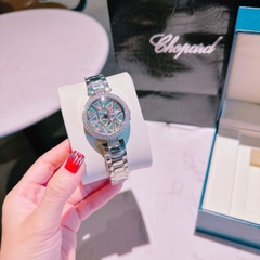 Chopard Mặt Xoay |Nữ Giới |Đính Pha Lê Màu |Dây Kim Loại Silver |Máy Pin (Quartz) |Size 35mm