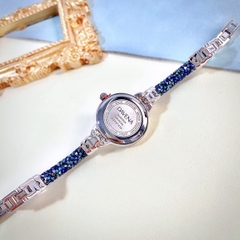 Davena Lắc Tay |Nữ Giới |Trắng Silver |Đính Đá Xanh |Dây Kim Loại |Máy Pin |Size Nhỏ 28mm