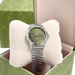 Gucci G-Timeless |Nam Giới |Mặt Xanh Lá |Dây Kim Loại Silver |Máy Pin (Quartz) |Size 38mm