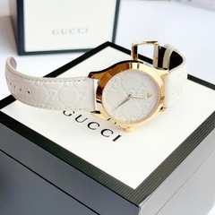 Gucci G-Timeless |Nữ |Vàng Gold |Dây Da Màu Trắng |Máy Pin (Quartz) |Size 38mm