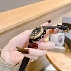 Guess Cosmic |Nữ Giới |Mặt Vàng Gold |Dây Cao Su Màu Đen |Máy Pin (Quartz) |Size 36mm