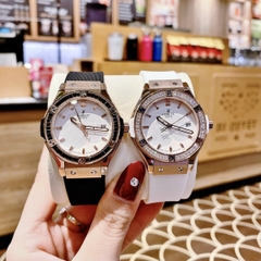 Hublot Geneve |Nữ Giới |Rose Gold |Mặt Trắng |Dây Silicone Đen |Máy Pin (Máy Quartz) |Size 34mm
