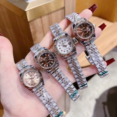 Rolex Mặt Số La Mã |Nữ Giới |Hồng |Niềng Khía |Dây Kim Loại Demi |Máy Pin (Máy Quartz) |Size 28mm