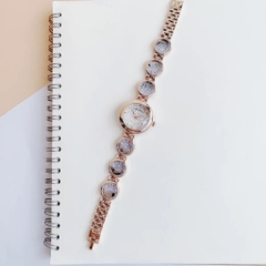Melissa Mặt Tròn |Nữ Giới |Rose Gold |Lắc Tay Đính Đá Rơi Màu Trắng |Máy Pin (Quartz) |Size 28mm
