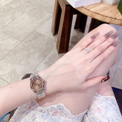 Rolex Date Just |Nữ Giới |Mặt Nâu |Niềng Khía |Dây Kim Loại Demi |Máy Pin (Máy Quartz) |Size 28mm