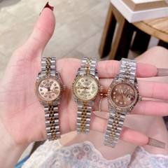 Rolex Date Just |Nữ Giới |Mặt Nâu |Niềng Khía |Dây Kim Loại Demi |Máy Pin (Máy Quartz) |Size 28mm