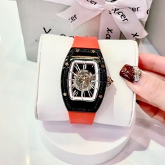 Xcer Đính Đá Đen |Nữ Giới |Mặt Oval |Lộ Máy |Dây Cao Su Đỏ |Máy Tự Động (Automatic) |Size 36mm