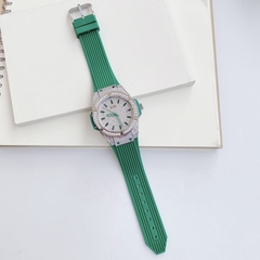 Xcer Tựa Hublot |Nữ Giới |Full Đá Silver |Dây Cao Su Xanh Lá |Máy Pin (Quartz) |Size 34mm