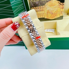 Rolex Niềng Khía |Nữ Giới |Mặt Nâu |Dây Kim Loại Demi Rose Gold |Máy Pin (Máy Quartz) |Size 31mm