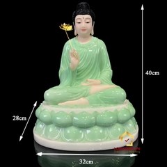 Tượng Phật Thích Ca ngồi đế sen bằng bột đá xanh ngọc tay cầm hoa sen vàng cao từ 20 cm đến 150 cm