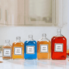 Chai thủy tinh dẹp vai cong 50ml - 500ml
