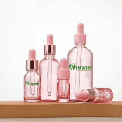 Chai thủy tinh nhỏ giọt dáng tròn màu hồng 5ml 10ml 15ml 20ml 30ml 50ml 100ml